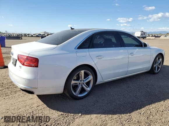 ✅ 2013 Audi A8 4.0L • VIN: WAUR2AFD1DN007515 • Lot: 82527465. Listed on Copart with 132,657 mi. Free auction sales archive from the USA and detailed vehicle history report at DreamBid. Image 3.