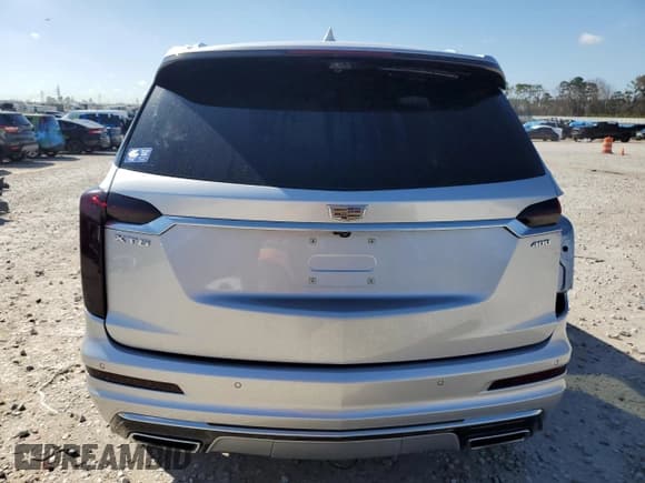 ✅ 2020 Cadillac XT6 FWD Premium Luxury • VIN: 1GYKPERSXLZ218589 • Лот: 46632615. Опубликован ранее на Copart с пробегом 57 876 миль. Бесплатный доступ к архиву аукционных продаж из США и подробный отчёт об истории автомобиля на DreamBid. Изображение 6.