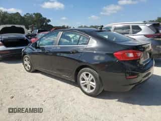 2017 Chevrolet Cruze LT z VIN 1G1BE5SM1H7226194, wystawiony jako Copart lot #81656955 z przebiegiem 126 662 mil mil oraz Szkoda całkowita • Salvage title. Historia ofert i sprzedaży dostępna na DreamBid. Obrazek 2.