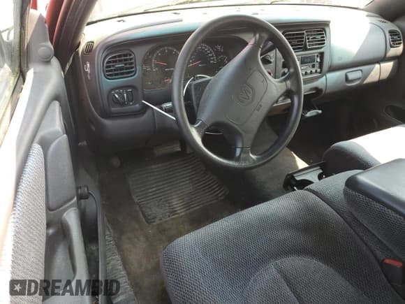 ✅ 1999 Dodge Dakota SLT • VIN: 1B7GL22X6XS243645 • Lot: 54258675. Wystawiony na Copart z przebiegiem 114 362 mil. Bezpłatny archiwum sprzedaży aukcyjnych z USA i szczegółowy raport historii pojazdu na DreamBid. Zdjęcie 8.