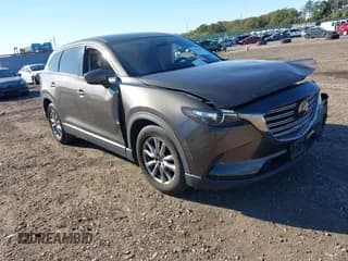 ✅ 2019 Mazda CX-9 Touring • VIN: JM3TCBCY1K0329043 • Лот: 43421829. Опубликован ранее на IAAI с пробегом 60 550 миль. Бесплатный доступ к архиву аукционных продаж из США и подробный отчёт об истории автомобиля на DreamBid. Изображение 1.