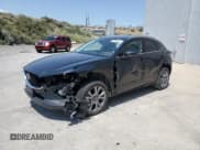 ✅ 2024 Mazda CX-30 S Premium • VIN: 3MVDMBDMXRM682702 • Lot: 59981805. Listed on Copart with 21,505 mi. Free auction sales archive from the USA and detailed vehicle history report at DreamBid. Image 1.