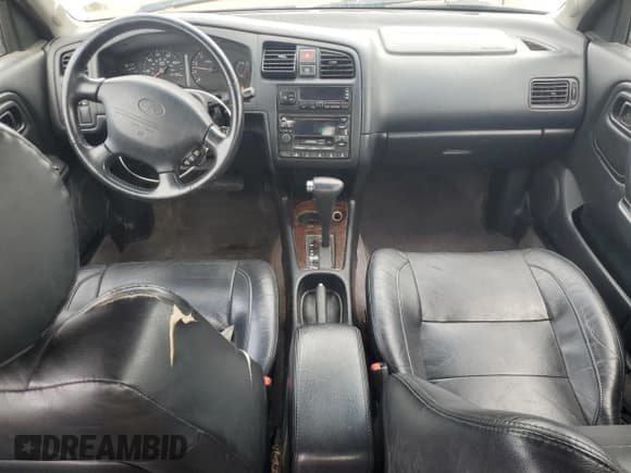 ✅ 2002 Infiniti G20 Luxury • VIN: JNKCP11A72T507144 • Лот: 54208075. Опубликован ранее на Copart с пробегом 189 441 миль. Бесплатный доступ к архиву аукционных продаж из США и подробный отчёт об истории автомобиля на DreamBid. Изображение 8.