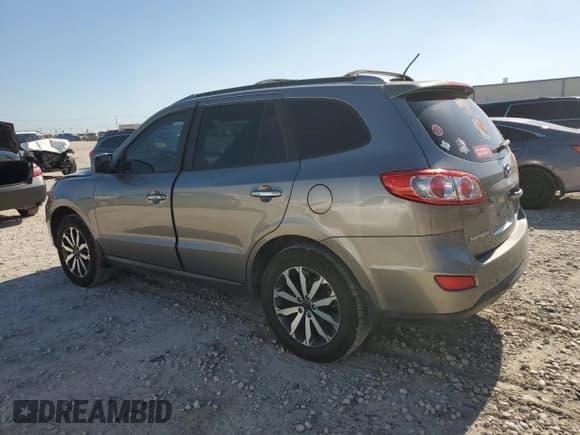 ✅ 2012 Hyundai Santa Fe Limited • VIN: 5XYZK3AB8CG112434 • Lot: 58263684. Listed on Copart with 132,303 mi. Free auction sales archive from the USA and detailed vehicle history report at DreamBid. Image 2.