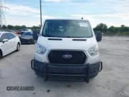 ✅ 2021 Ford Transit Cargo • VIN: 1FTBR1Y8XMKA21124 • Lot: 43094857. Wystawiony na IAAI z przebiegiem 382 981 mil. Bezpłatny archiwum sprzedaży aukcyjnych z USA i szczegółowy raport historii pojazdu na DreamBid. Zdjęcie 12.