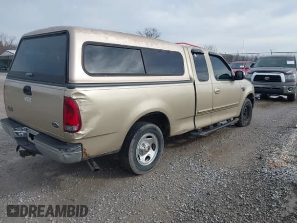 ✅ 2000 Ford F-150 XL • VIN: 1FTRX17L9YNB47943 • Lot: 43767060. Listed on IAAI with 272,843 mi. Free auction sales archive from the USA and detailed vehicle history report at DreamBid. Image 4.
