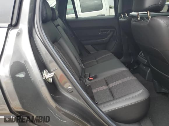 ✅ 2025 Mazda CX-50 S Premium • VIN: 7MMVABDM6SN315127 • Лот: 81562345. Опубликован ранее на Copart с пробегом 2 261 миль. Бесплатный доступ к архиву аукционных продаж из США и подробный отчёт об истории автомобиля на DreamBid. Изображение 11.