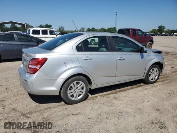 2017 Chevrolet Sonic LS z VIN 1G1JA5SH0H4171085, wystawiony jako Copart lot #52207145 z przebiegiem 26 933 mil mil oraz Szkoda całkowita • Salvage title. Historia ofert i sprzedaży dostępna na DreamBid. Obrazek 3.