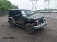 ✅ 2007 Jeep Wrangler Rubicon • VIN: 1J4GA64117L149666 • Lot: 42252464. Listed on IAAI with 100,791 mi. Free auction sales archive from the USA and detailed vehicle history report at DreamBid. Image 1.