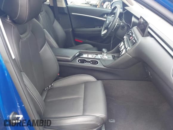 ✅ 2023 Genesis G70 2.0T • VIN: KMTG34TA3PU108473 • Lot: 42424368. Wystawiony na IAAI z przebiegiem 31 009 mil. Bezpłatny archiwum sprzedaży aukcyjnych z USA i szczegółowy raport historii pojazdu na DreamBid. Zdjęcie 5.