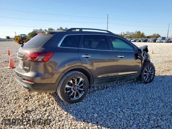 ✅ 2015 Mazda CX-9 Grand Touring • VIN: JM3TB2DA1F0468308 • Lot: 90945705. Wystawiony na Copart z przebiegiem 154 037 mil. Bezpłatny archiwum sprzedaży aukcyjnych z USA i szczegółowy raport historii pojazdu na DreamBid. Zdjęcie 3.