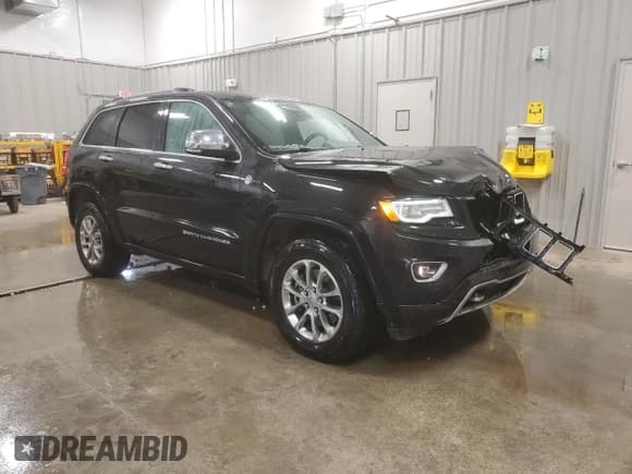 ✅ 2015 Jeep Grand Cherokee Overland • VIN: 1C4RJFCM8FC815544 • Lot: 80519904. Listed on Copart with 132,490 mi. Free auction sales archive from the USA and detailed vehicle history report at DreamBid. Image 4.