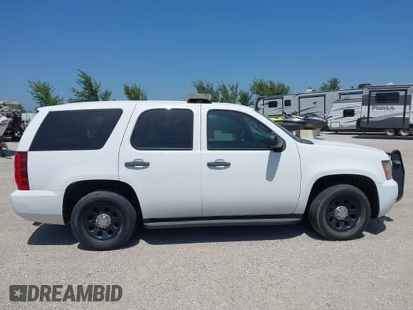✅ 2013 Chevrolet Tahoe Commercial • VIN: 1GNLC2E05DR161378 • Lot: 42671610. Wystawiony na IAAI z przebiegiem 190 214 mil. Bezpłatny archiwum sprzedaży aukcyjnych z USA i szczegółowy raport historii pojazdu na DreamBid. Zdjęcie 13.