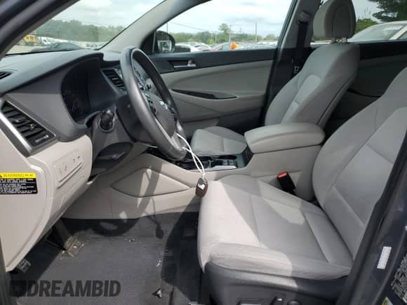 2017 Hyundai Tucson Sport with VIN KM8J3CA26HU593389, listed as a Copart auction lot 82147725 with 65,174 mi miles and Salvage title. Bid and sale history available at DreamBid. Image 7.