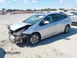 ✅ 2017 Toyota Prius Three • VIN: JTDKARFU3H3543566 • Лот: 43643594. Опубликован ранее на IAAI с пробегом 174 865 миль. Бесплатный доступ к архиву аукционных продаж из США и подробный отчёт об истории автомобиля на DreamBid. Изображение 2.