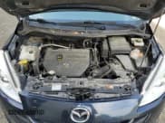 ✅ 2014 Mazda 5 Grand Touring • VIN: JM1CW2DLXE0168554 • Lot: 61891125. Wystawiony na Copart z przebiegiem 106 200 mil. Bezpłatny archiwum sprzedaży aukcyjnych z USA i szczegółowy raport historii pojazdu na DreamBid. Zdjęcie 12.