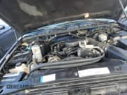 ✅ 1998 Chevrolet S-10 LS • VIN: 1GCCS19XXW8237764 • Lot: 84794834. Wystawiony na Copart z przebiegiem 70 387 mil. Bezpłatny archiwum sprzedaży aukcyjnych z USA i szczegółowy raport historii pojazdu na DreamBid. Zdjęcie 11.