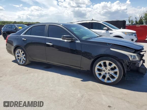 ✅ 2014 Cadillac CTS Performance RWD • VIN: 1G6AS5S33E0128732 • Lot: 59728745. Listed on Copart with 169,006 mi. Free auction sales archive from the USA and detailed vehicle history report at DreamBid. Image 4.