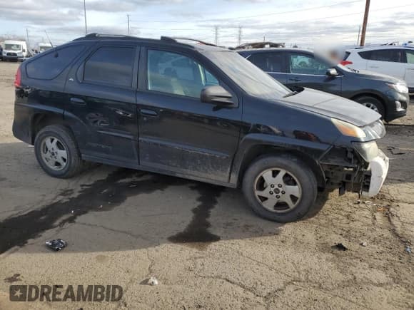 ✅ 2002 Pontiac Aztek • VIN: 3G7DA03E22S584224 • Lot: 87851655. Listed on Copart with 218,653 mi. Free auction sales archive from the USA and detailed vehicle history report at DreamBid. Image 4.