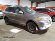 ✅ 2012 Hyundai Santa Fe GLS • VIN: 5XYZGDAB2CG164617 • Lot: 84761684. Listed on Copart with 226,387 mi. Free auction sales archive from the USA and detailed vehicle history report at DreamBid. Image 4.