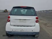 ✅ 2009 Smart fortwo Pure • VIN: WMEEJ31X39K322229 • Lot: 95828695. Wystawiony na Copart z przebiegiem 88 447 mil. Bezpłatny archiwum sprzedaży aukcyjnych z USA i szczegółowy raport historii pojazdu na DreamBid. Zdjęcie 10.