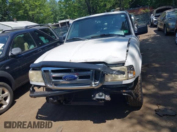 ✅ 2011 Ford Ranger XLT • VIN: 1FTKR4EEXBPA21538 • Lot: 42573198. Listed on IAAI with 117,192 mi. Free auction sales archive from the USA and detailed vehicle history report at DreamBid. Image 13.