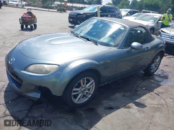✅ 2013 Mazda MX-5 Miata Sport • VIN: JM1NC2JF9D0231674 • Lot: 39599604. Listed on IAAI with 157,991 mi. Free auction sales archive from the USA and detailed vehicle history report at DreamBid. Image 17.