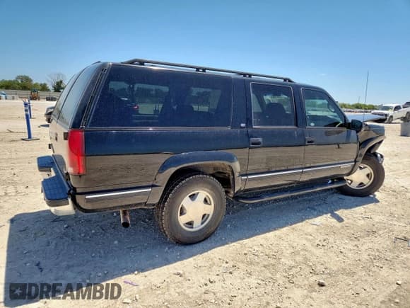 ✅ 1999 GMC Suburban • VIN: 3GKFK16R7XG543162 • Lot: 70941665. Listed on Copart with 139,439 mi. Free auction sales archive from the USA and detailed vehicle history report at DreamBid. Image 3.