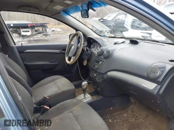 ✅ 2007 Chevrolet Aveo LS • VIN: KL1TD56667B175174 • Lot: 42012342. Wystawiony na IAAI z przebiegiem 100 534 mil. Bezpłatny archiwum sprzedaży aukcyjnych z USA i szczegółowy raport historii pojazdu na DreamBid. Zdjęcie 5.