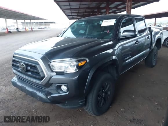 ✅ 2023 Toyota Tacoma SR5 • VIN: 3TMAZ5CN6PM199982 • Lot: 43087053. Listed on IAAI with 38,883 mi. Free auction sales archive from the USA and detailed vehicle history report at DreamBid. Image 18.