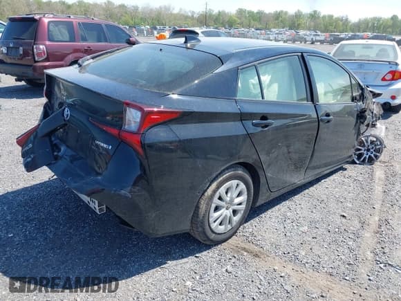 ✅ 2021 Toyota Prius L Eco • VIN: JTDKAMFU6M3150237 • Lot: 42085038. Listed on IAAI with 86,175 mi. Free auction sales archive from the USA and detailed vehicle history report at DreamBid. Image 4.