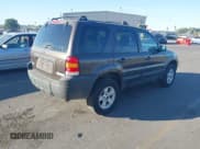 ✅ 2006 Ford Escape XLT • VIN: 1FMYU93156KC72455 • Lot: 42967500. Listed on IAAI with 213,859 mi. Free auction sales archive from the USA and detailed vehicle history report at DreamBid. Image 4.