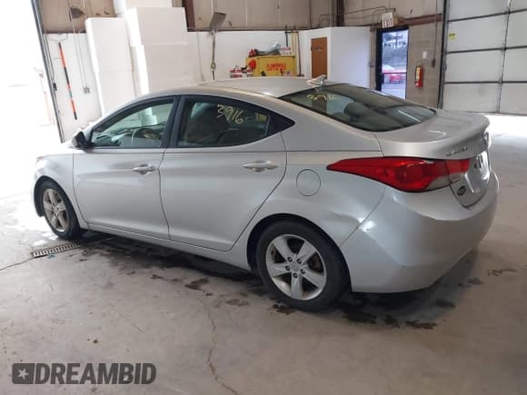 ✅ 2012 Hyundai Elantra Limited • VIN: KMHDH4AE0CU208013 • Lot: 42423916. Listed on IAAI with 205,324 mi. Free auction sales archive from the USA and detailed vehicle history report at DreamBid. Image 3.