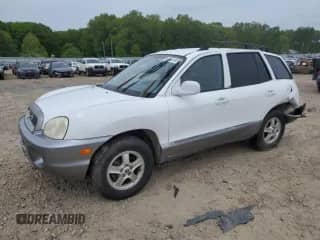 2001 Hyundai Santa Fe GLS z VIN KM8SC83D61U090371, wystawiony jako Copart lot #53953495 z przebiegiem 174 241 mil mil oraz Czysty tytuł • Clean title. Historia ofert i sprzedaży dostępna na DreamBid. Obrazek 1.