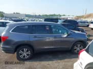 ✅ 2017 Honda Pilot EX-L • VIN: 5FNYF6H5XHB093028 • Lot: 42452779. Listed on IAAI with 134,559 mi. Free auction sales archive from the USA and detailed vehicle history report at DreamBid. Image 13.