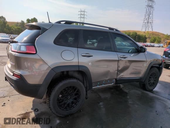 ✅ 2020 Jeep Cherokee Trailhawk Elite • VIN: 1C4PJMBX0LD506809 • Lot: 67037355. Listed on Copart with 17,996 mi. Free auction sales archive from the USA and detailed vehicle history report at DreamBid. Image 3.