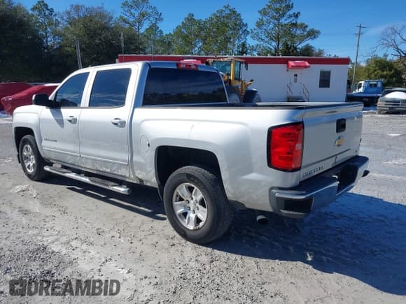 ✅ 2018 Chevrolet Silverado 1500 LT • VIN: 3GCPCREH6JG359777 • Лот: 41377806. Опубликован ранее на IAAI с пробегом 133 611 миль. Бесплатный доступ к архиву аукционных продаж из США и подробный отчёт об истории автомобиля на DreamBid. Изображение 3.