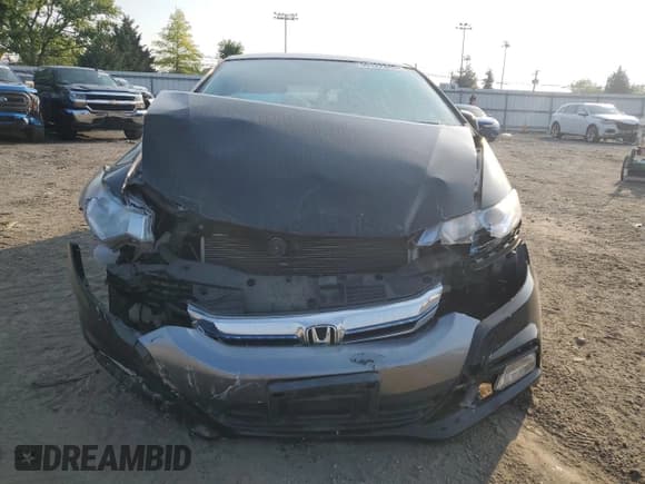 ✅ 2014 Honda Insight LX • VIN: JHMZE2H58ES002321 • Lot: 60122345. Wystawiony na Copart z przebiegiem 85 043 mil. Bezpłatny archiwum sprzedaży aukcyjnych z USA i szczegółowy raport historii pojazdu na DreamBid. Zdjęcie 5.