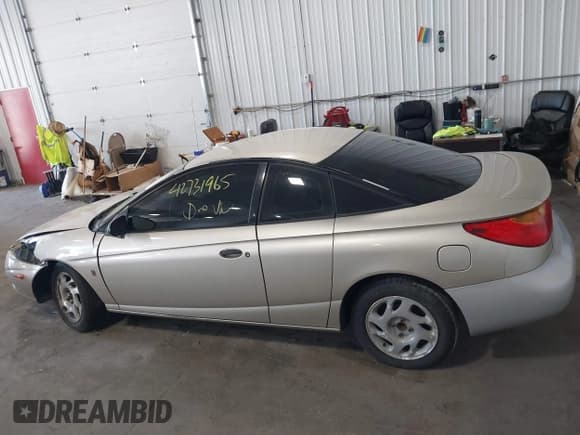 ✅ 2001 Saturn SC • VIN: 1G8ZP12841Z300417 • Лот: 42731965. Опубликован ранее на IAAI с пробегом 151 041 миль. Бесплатный доступ к архиву аукционных продаж из США и подробный отчёт об истории автомобиля на DreamBid. Изображение 14.