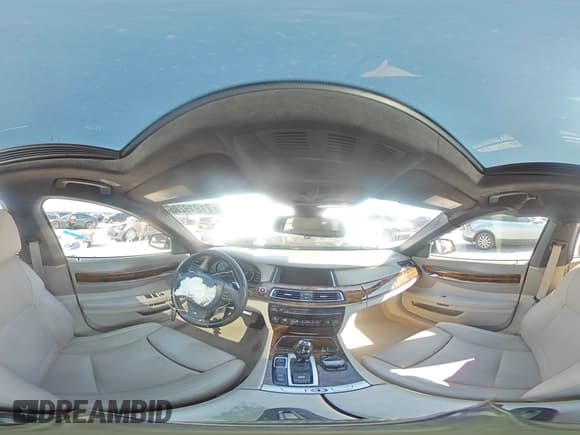 ✅ 2015 BMW 7 Series 750i • VIN: WBAYA8C51FG197604 • Lot: 71919285. Listed on Copart with 165,914 mi. Free auction sales archive from the USA and detailed vehicle history report at DreamBid. Image 15.