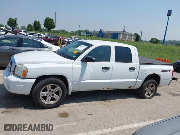 ✅ 2007 Dodge Dakota ST • VIN: 1D7HW28KX7S270795 • Лот: 42452595. Опубликован ранее на IAAI с пробегом 206 775 миль. Бесплатный доступ к архиву аукционных продаж из США и подробный отчёт об истории автомобиля на DreamBid. Изображение 14.