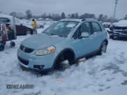 ✅ 2009 Suzuki SX4 Touring AWD • VIN: JS2YB417895100966 • Lot: 43831762. Listed on IAAI with 146,076 mi. Free auction sales archive from the USA and detailed vehicle history report at DreamBid. Image 2.