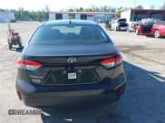 ✅ 2021 Toyota Corolla LE • VIN: 5YFEPMAE9MP242137 • Lot: 43702103. Listed on IAAI with 98,625 mi. Free auction sales archive from the USA and detailed vehicle history report at DreamBid. Image 16.