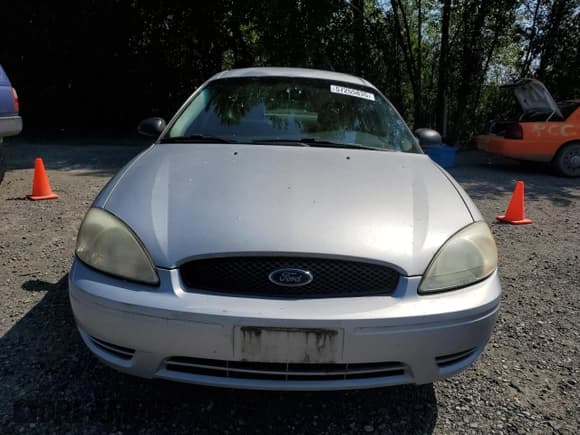 ✅ 2005 Ford Taurus SE • VIN: 1FAFP53U05A259841 • Lot: 57255835. Listed on Copart with 179,821 mi. Free auction sales archive from the USA and detailed vehicle history report at DreamBid. Image 5.