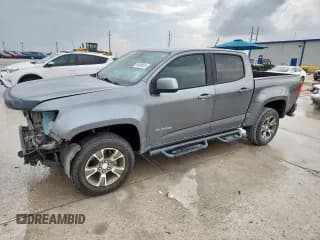 ✅ 2020 Chevrolet Colorado 4WD Z71 • VIN: 1GCGTDEN5L1221240 • Lot: 63400025. Listed on Copart with 92,938 mi. Free auction sales archive from the USA and detailed vehicle history report at DreamBid. Image 1.