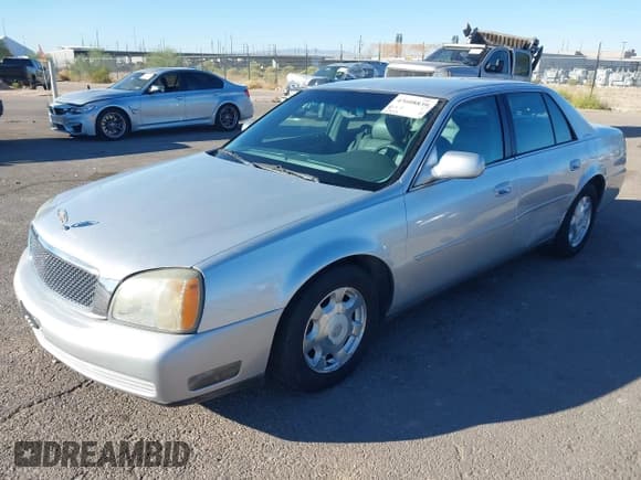 ✅ 2002 Cadillac DeVille • VIN: 1G6KD54Y62U107997 • Lot: 43608839. Listed on IAAI with 107,528 mi. Free auction sales archive from the USA and detailed vehicle history report at DreamBid. Image 2.