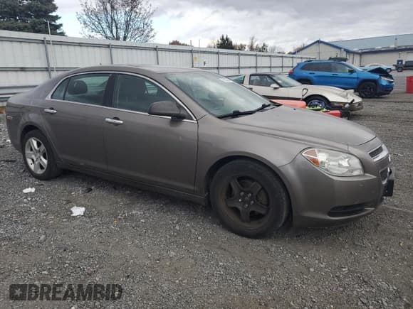 ✅ 2011 Chevrolet Malibu 1LS • VIN: 1G1ZB5E15BF171755 • Lot: 78909654. Listed on Copart with 287,672 mi. Free auction sales archive from the USA and detailed vehicle history report at DreamBid. Image 4.