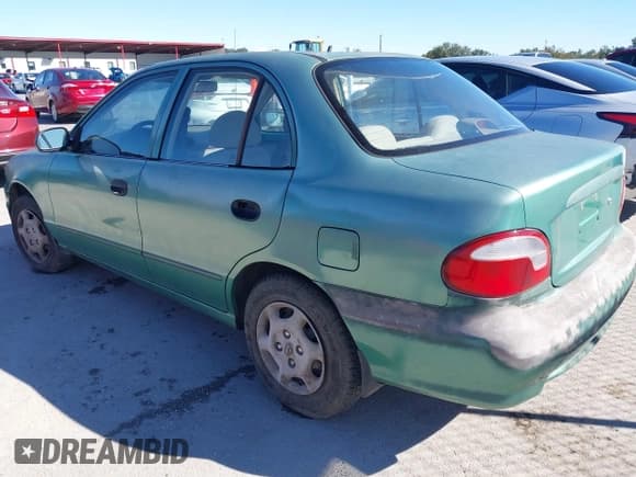 ✅ 1998 Hyundai Accent GL • VIN: KMHVF24NXWU506566 • Лот: 43575139. Опубликован ранее на IAAI с пробегом 144 846 миль. Бесплатный доступ к архиву аукционных продаж из США и подробный отчёт об истории автомобиля на DreamBid. Изображение 3.
