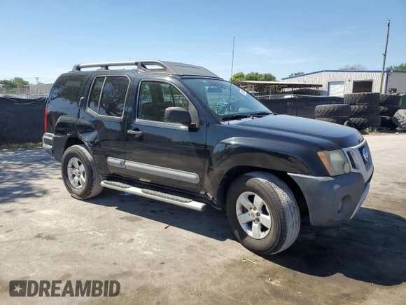 ✅ 2011 Nissan Xterra S • VIN: 5N1AN0NU6BC519214 • Lot: 50699035. Listed on Copart with 203,716 mi. Free auction sales archive from the USA and detailed vehicle history report at DreamBid. Image 4.