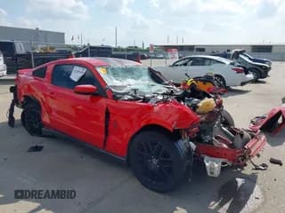 ✅ 2012 Ford Mustang Premium • VIN: 1ZVBP8AM6C5241456 • Lot: 42308248. Listed on IAAI with 136,230 mi. Free auction sales archive from the USA and detailed vehicle history report at DreamBid. Image 1.